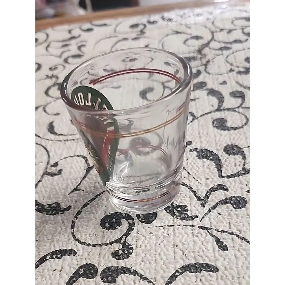 Yellowstone Shot Glass with Green and Gold Logo